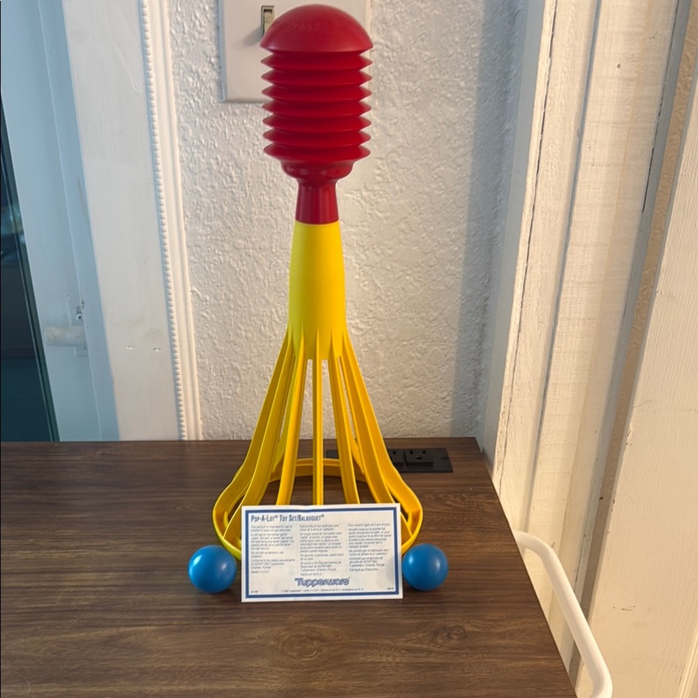 COPY - New Vintage Tupperware Pop-A-Lot Toy